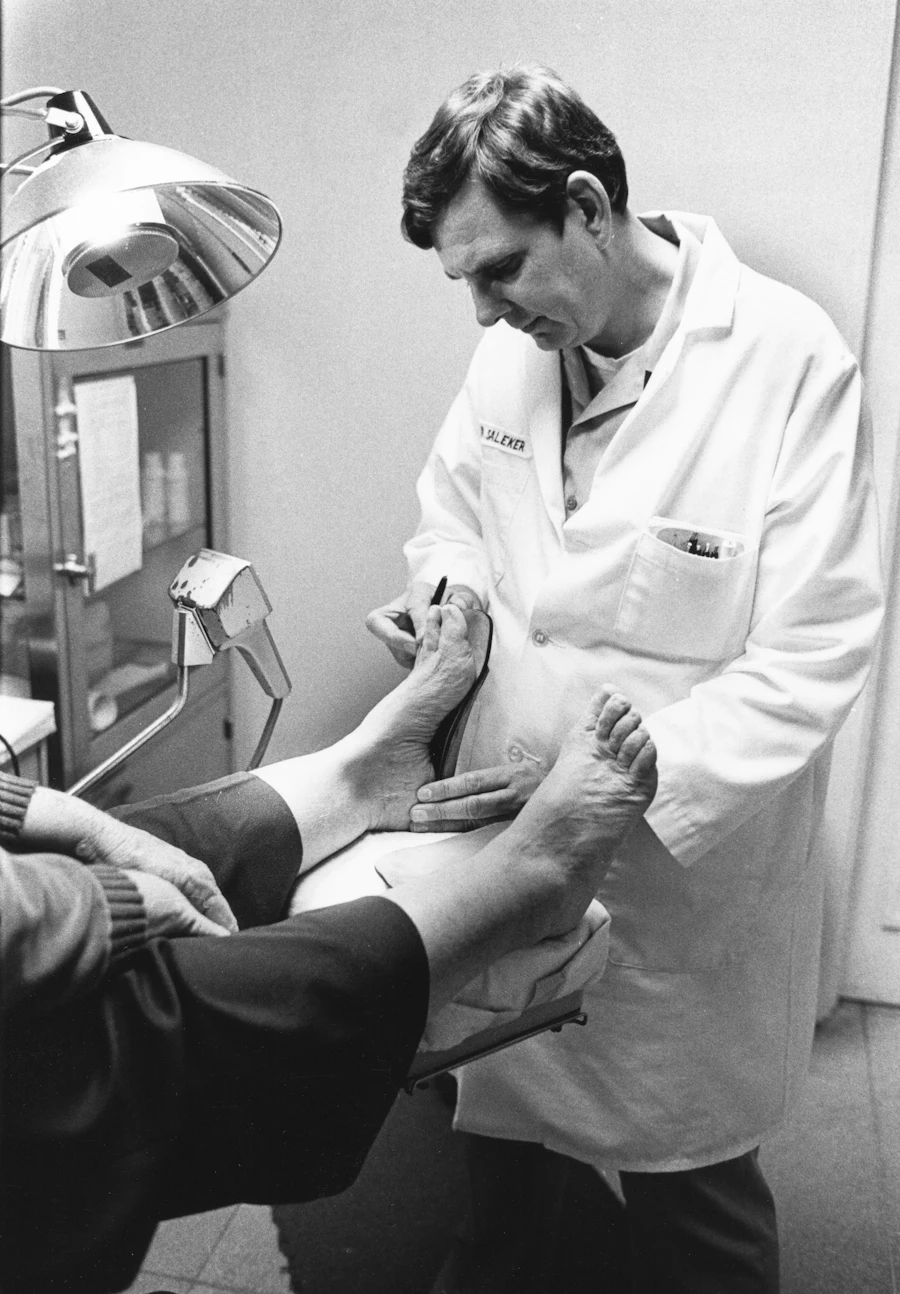 Doctor examining a patient's foot