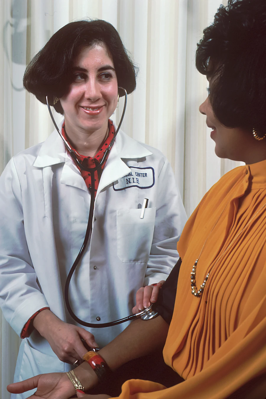 Doctor checking a woman patient